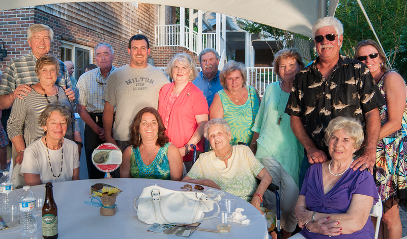 Wagamon family members and guests gather at the Burton's Wagamon Pond property in Milton. They include in back (l-r) Bill Wagamon, Bill Graves, DJ Hughes, Brenda Wagamon Hughes, Denny Hughes, Mary Anne Wagamon Chorman, Sally Wagamon Jones, Richie Wagamon and Karen Wagamon. In front are Allyn Wagamon, and seated, Ellen Wagamon Graves, Kristie Wagamon O'Connell, Sara Wagamon Burnham, and Lydia Wagamon. At the celebration but not pictured are Karen Wagamon and her daughter, Christina Wagamon Harvey. BY DENY HOWETH